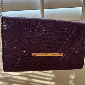 Purple snakeskin clutch with chain